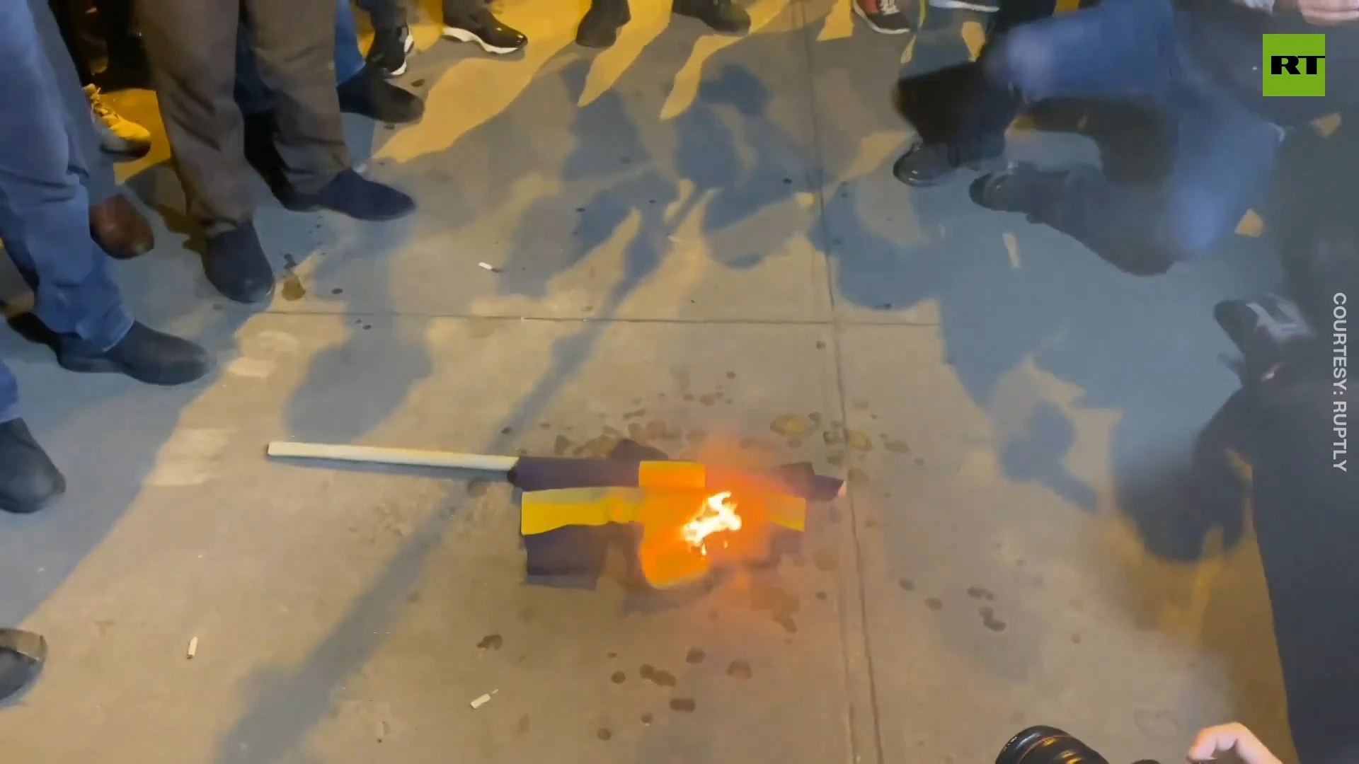 Turkish activists set Swedish flag on fire following Quran burning in Stockholm