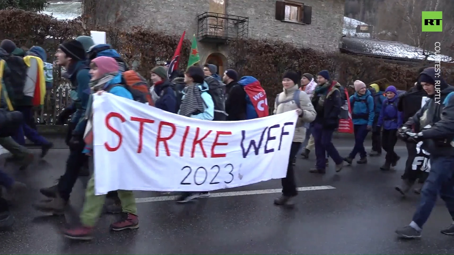 ‘Tax the rich’: Protesters march in Davos ahead of World Economic Forum