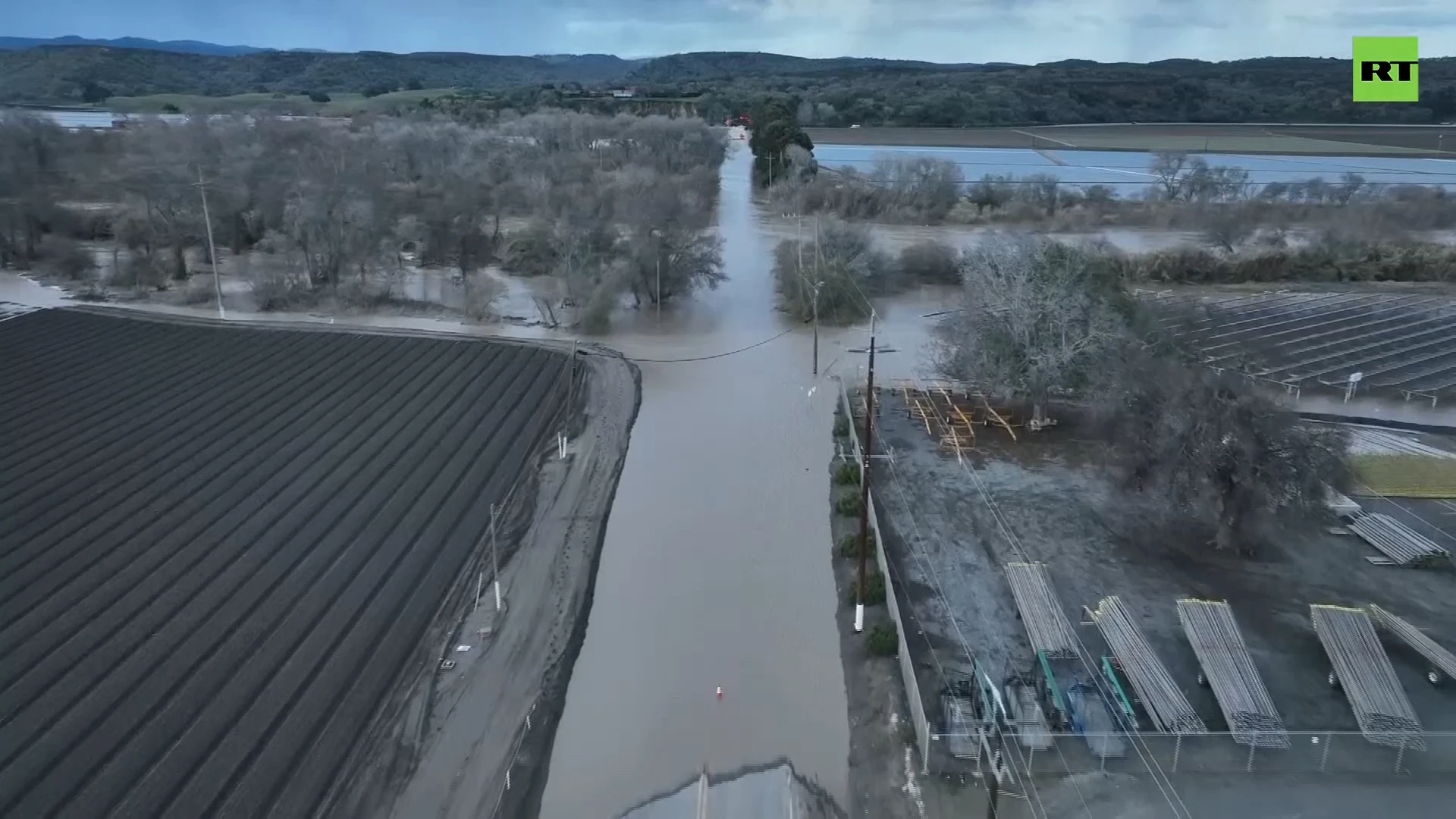 California farm fields submerged by flooding