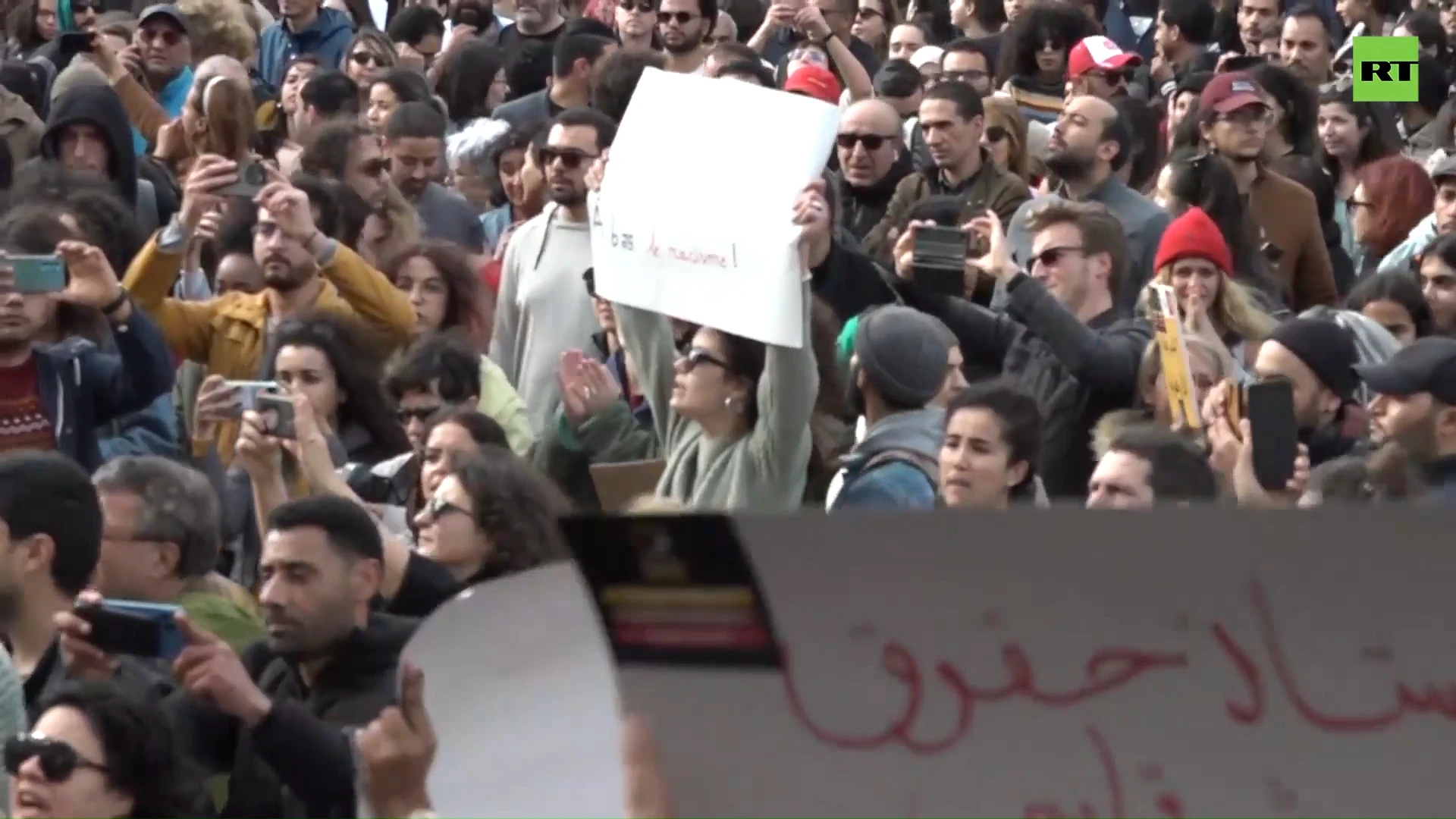 Protesters rally, condemning discrimination against sub-Saharan migrants in Tunis