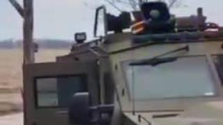 System pigs use their fancy armored car to invade people's property