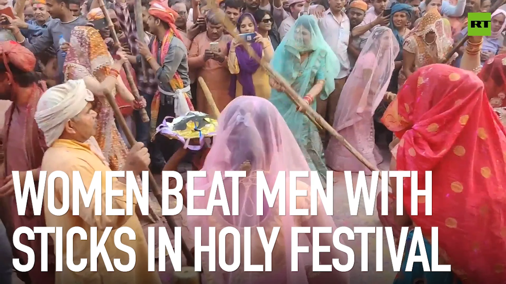 Women beat men with sticks in holy festival