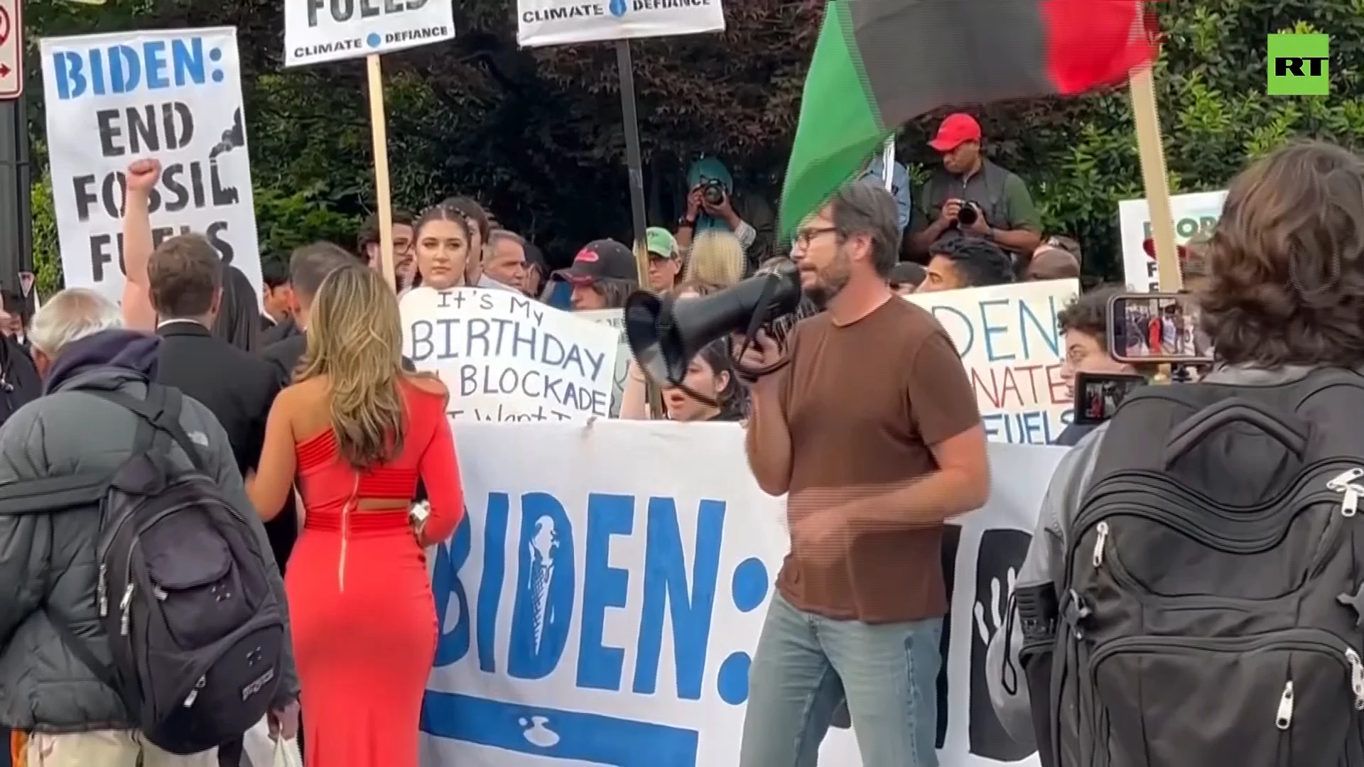 Climate activists protest as journalists arrive for correspondents’ dinner in DC