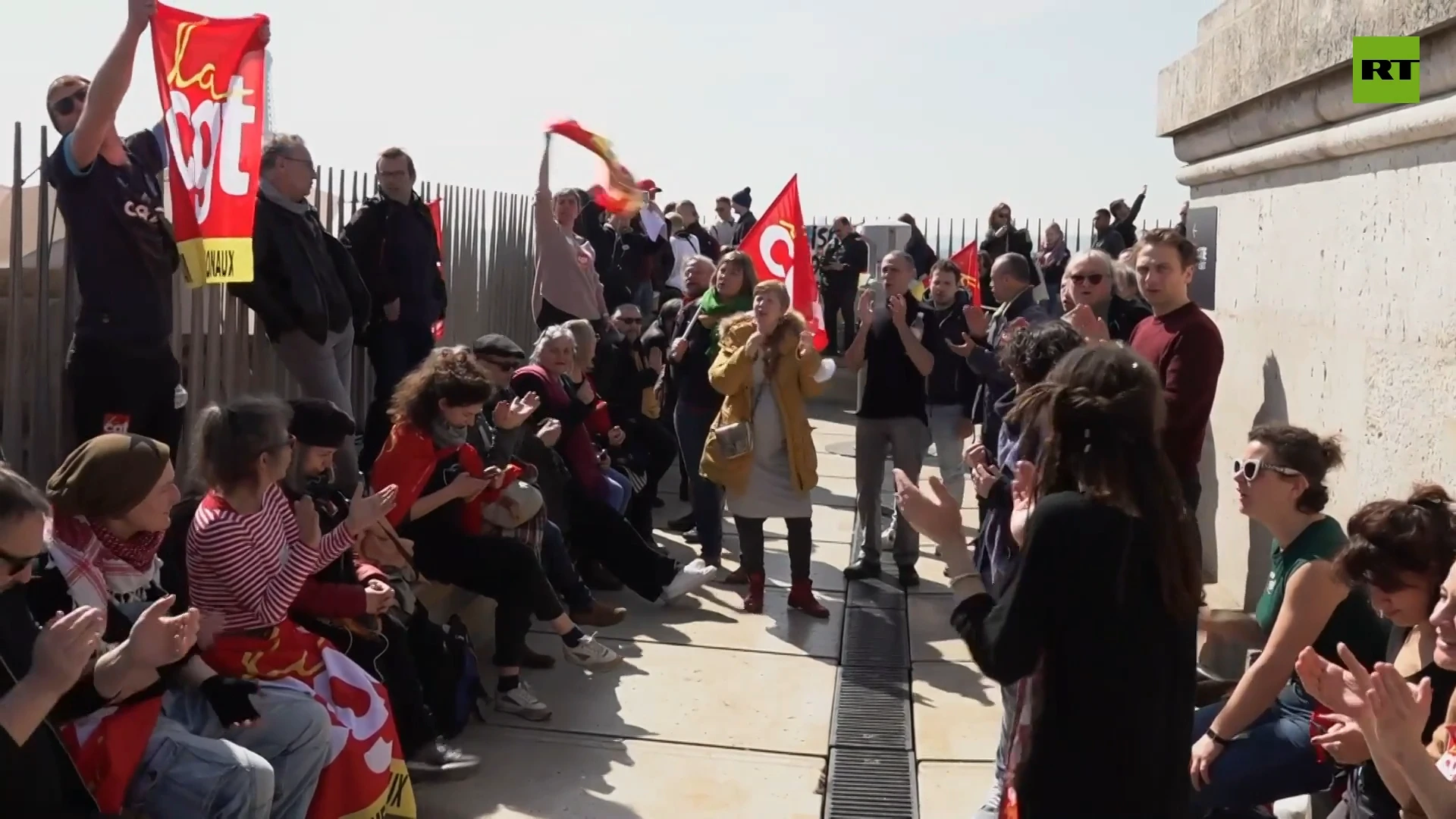 'Can't be 64'| Activists raise banners on Paris' Arc de Triomphe as pension reform protest continues