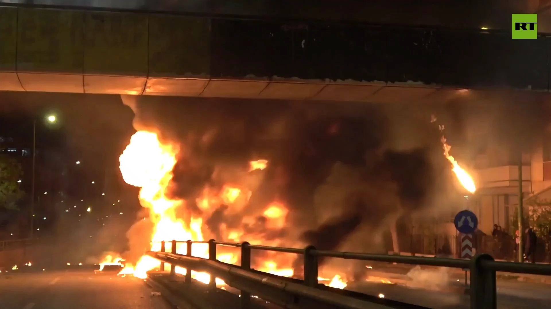 Greeks celebrate Easter by throwing Molotov cocktails and setting street fires