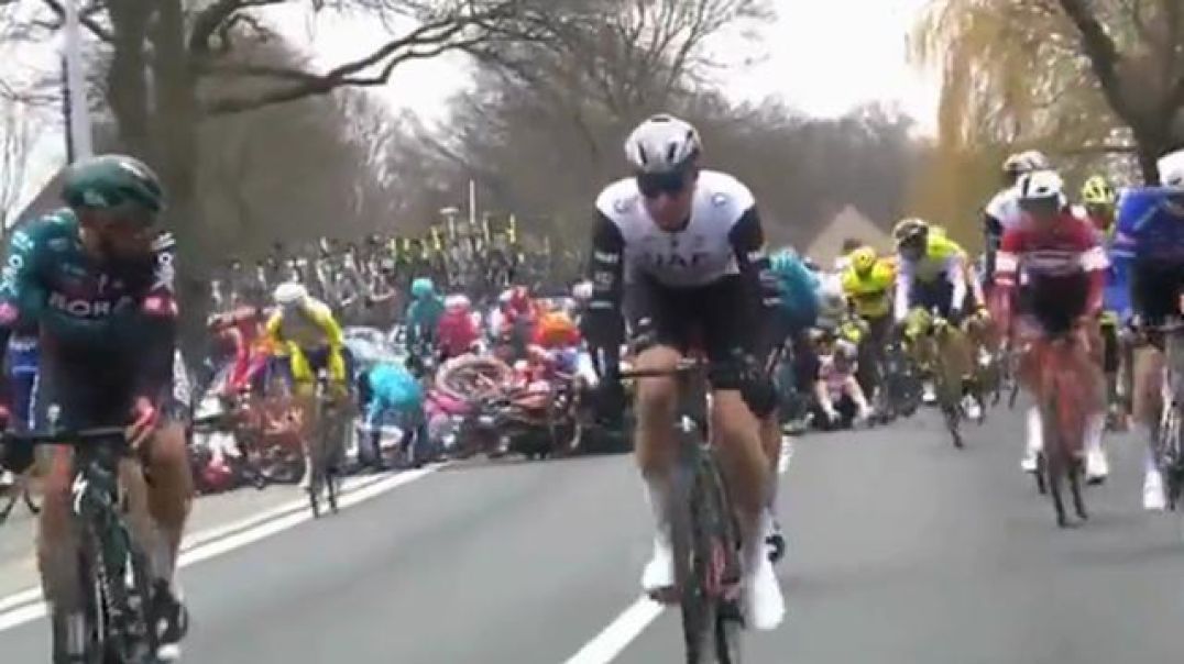 Belgium. Massive crash at Tour Of Flanders; His other bike is a BMX.