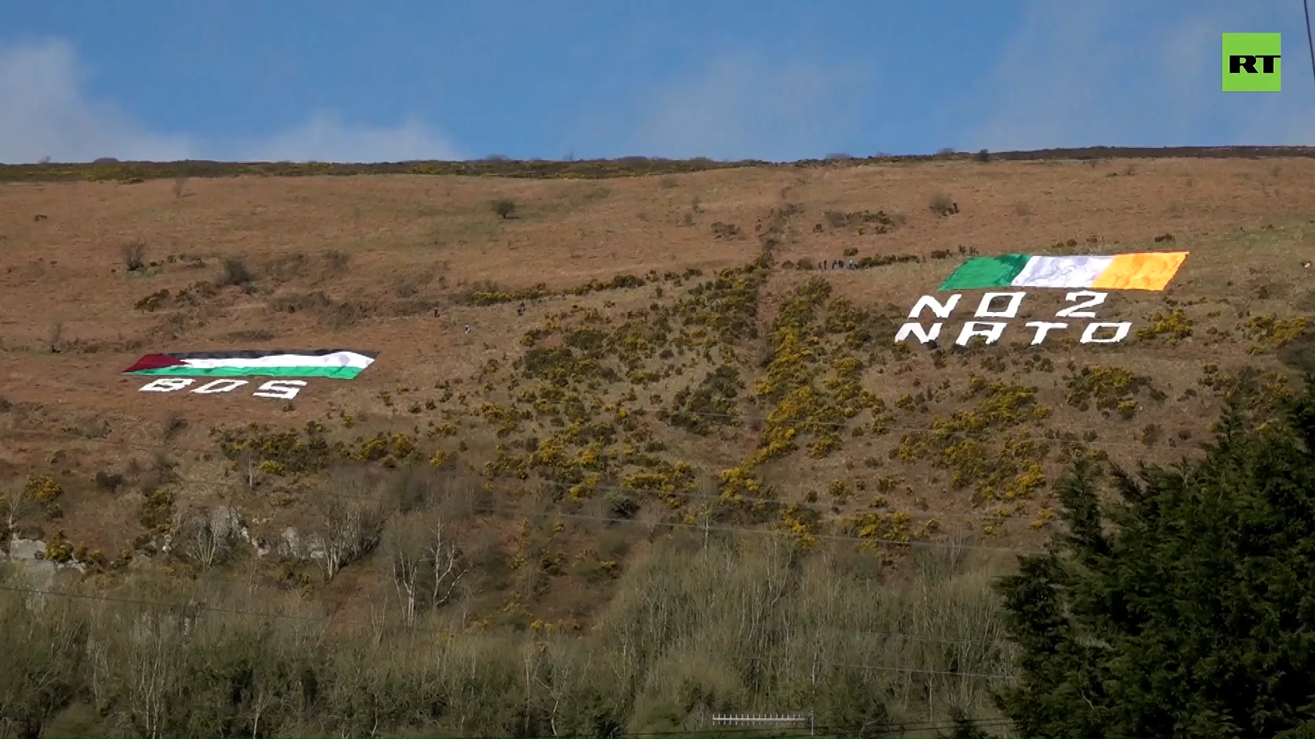 ‘No 2 NATO’: Activists send message to Biden on his arrival in Belfast