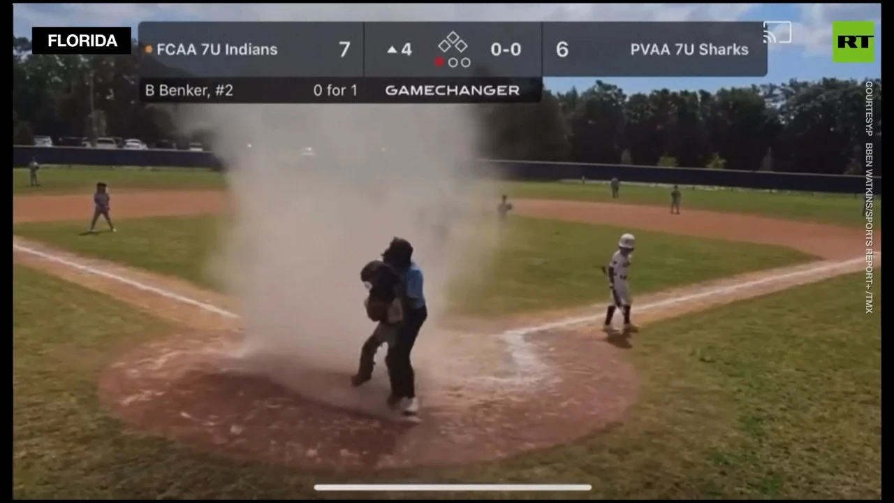 Child saved from freak dust devil at ball game