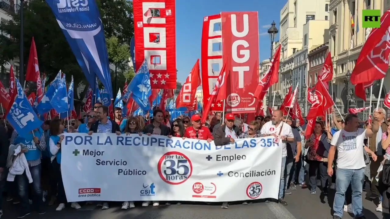 Hundreds march in Madrid calling for less working hours