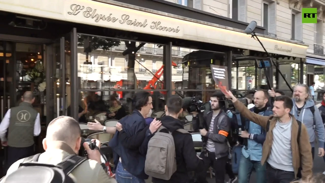 Paris police use tear gas, pepper spray to disperse climate rally against TotalEnergies