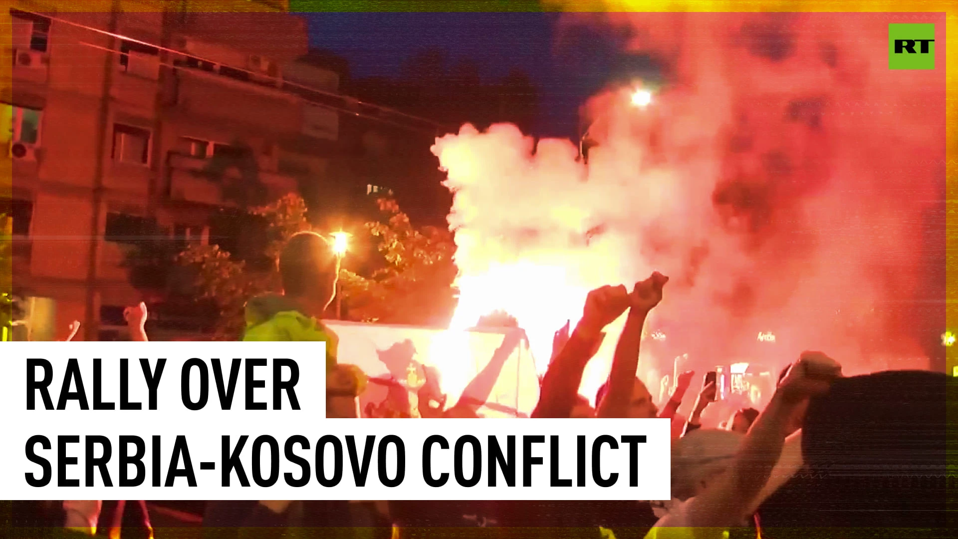 Red flares light up as hundreds of Serbs denounce Germany's role in Kosovo conflict