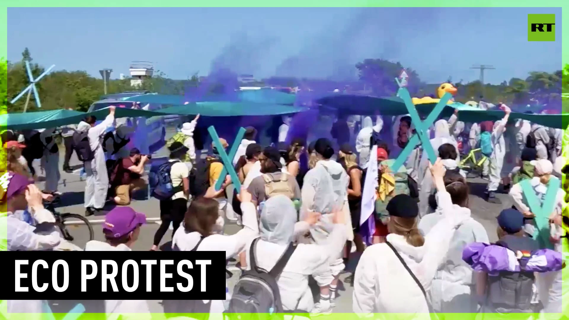 Smoke torches burn as climate activists protest LNG terminal construction