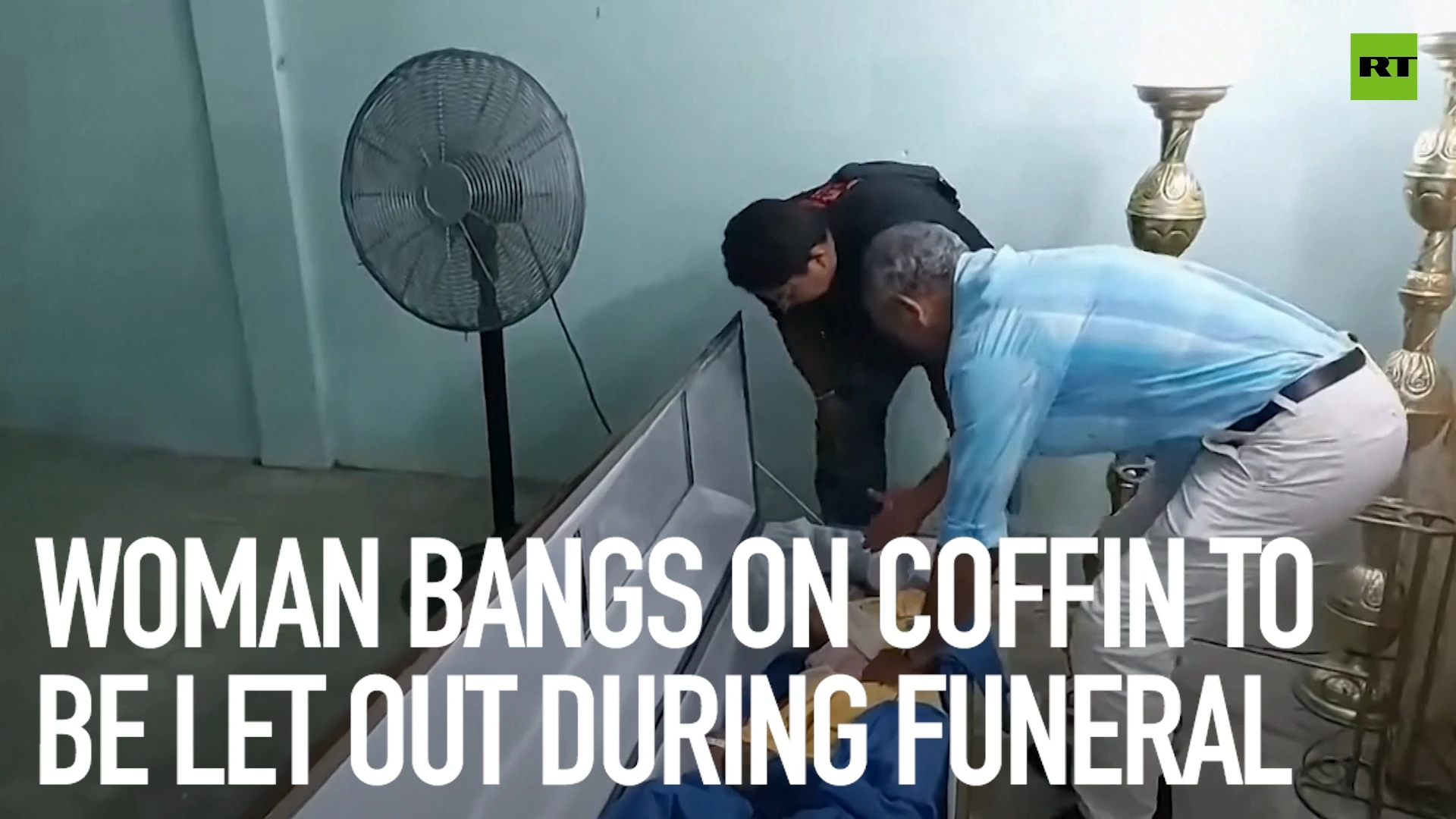 Woman bangs on coffin to be let out during funeral