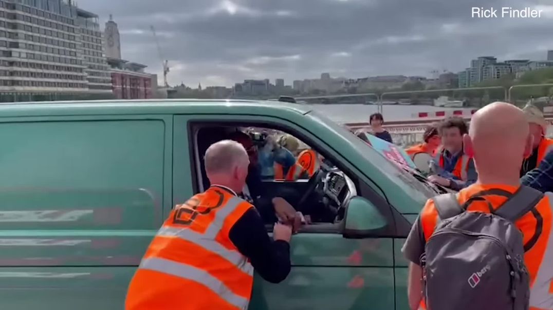 Van driver ploughs through Just Stop Oil protesters in London