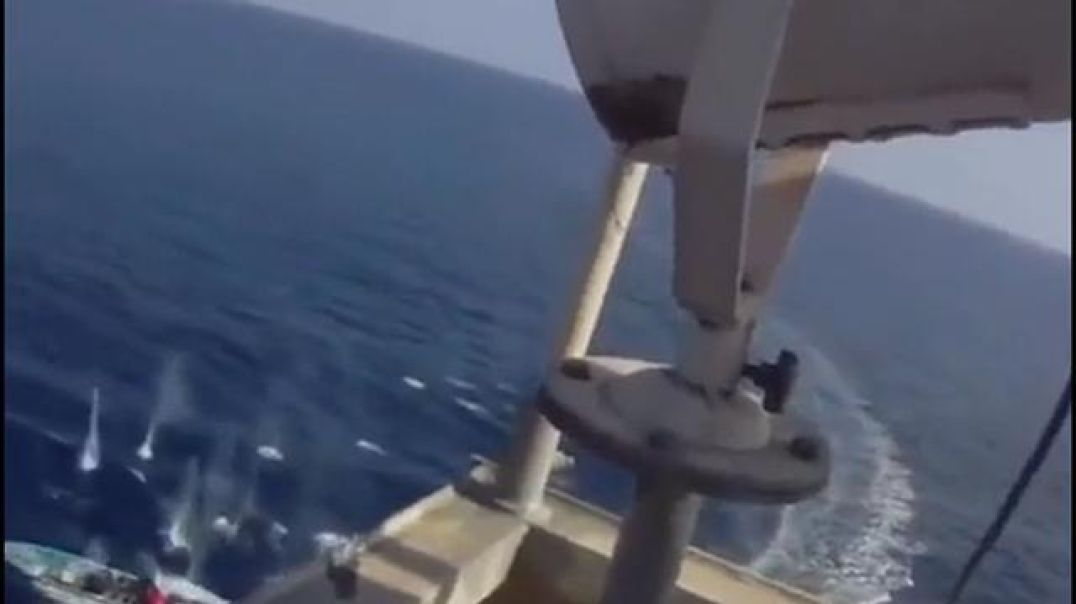 Cargo ship security officers fight off pirates attempting to board their ship