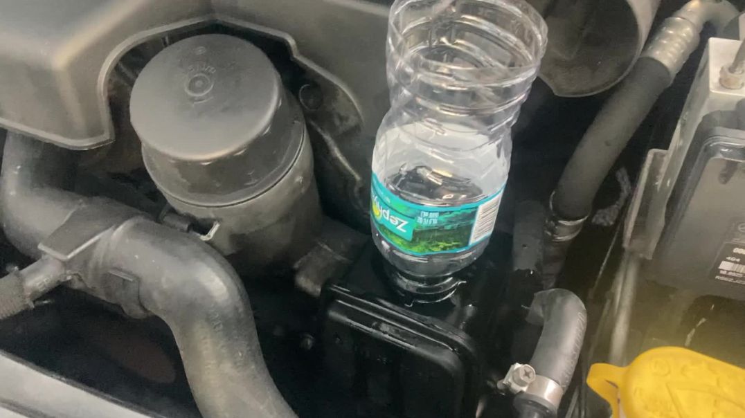 How To Use A Plastic Bottle As A Funnel For Your Car