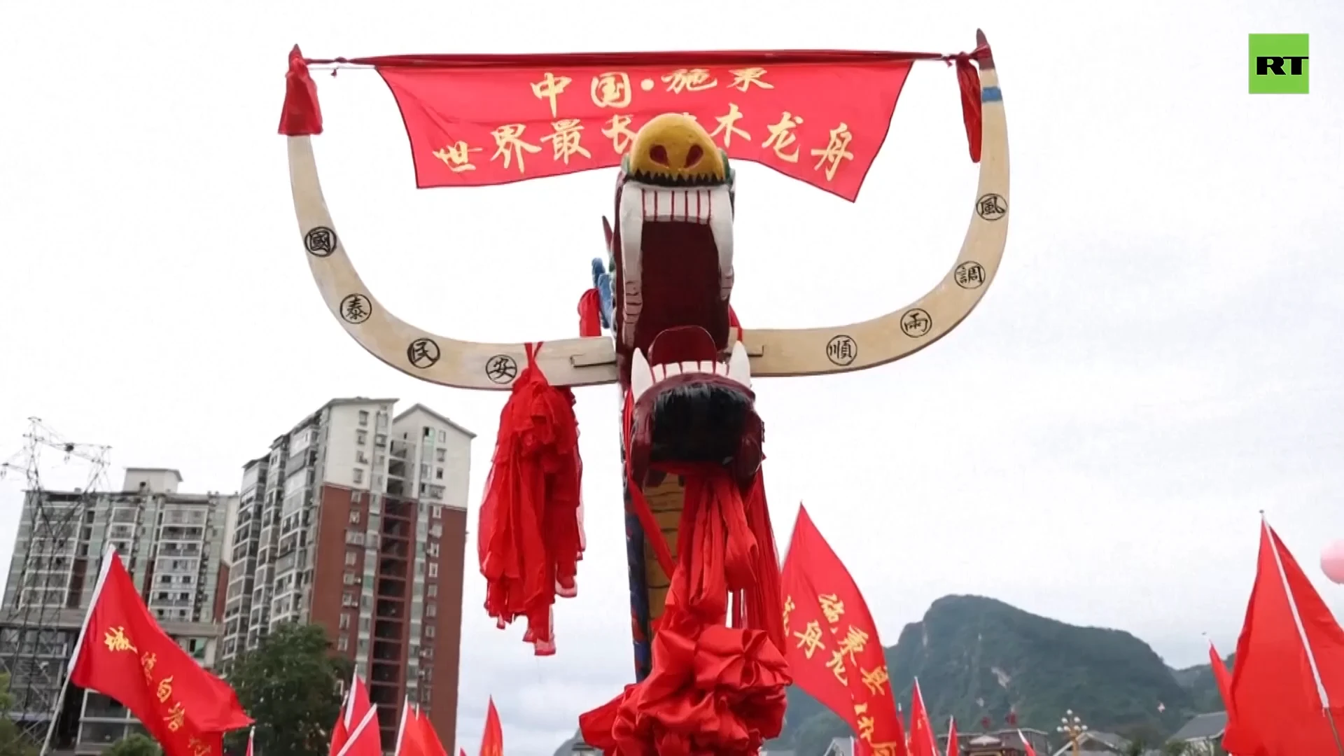 Over 2,000 men transport world's longest '100-meter dragon boat'