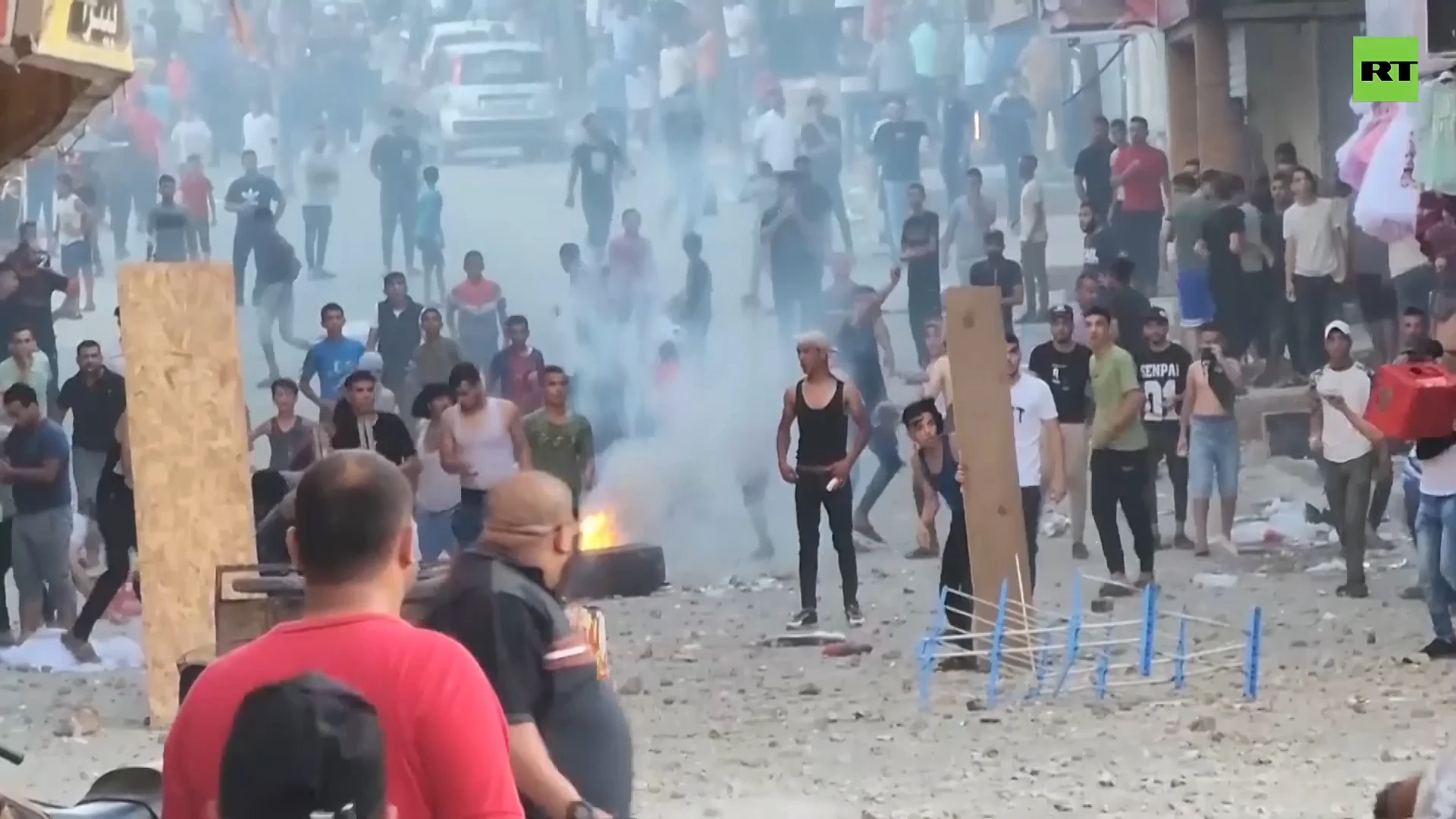 Pro and anti-Hamas protesters clash in Gaza