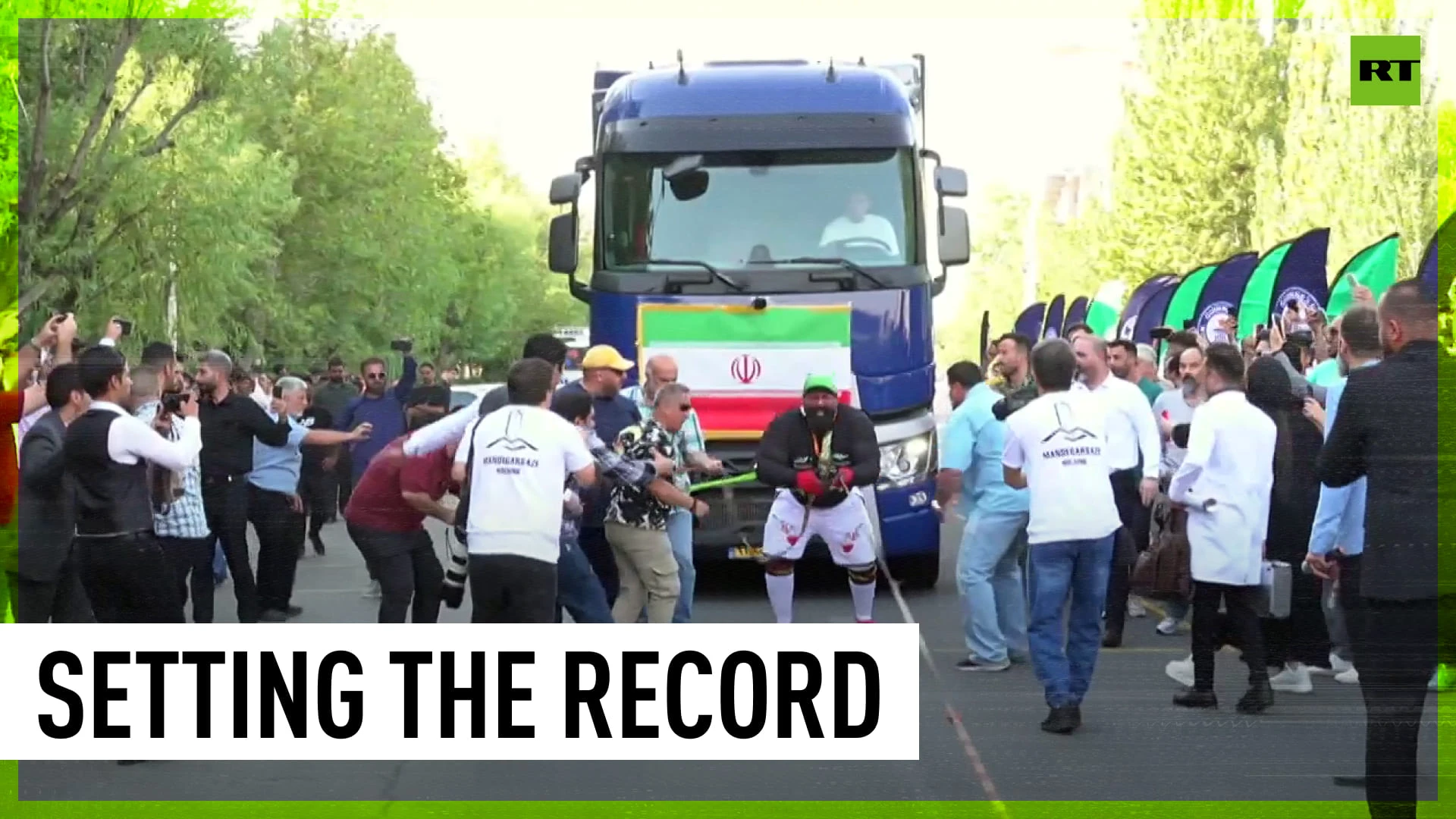 ‘Hercules of Iran’ drags 95-ton trucks