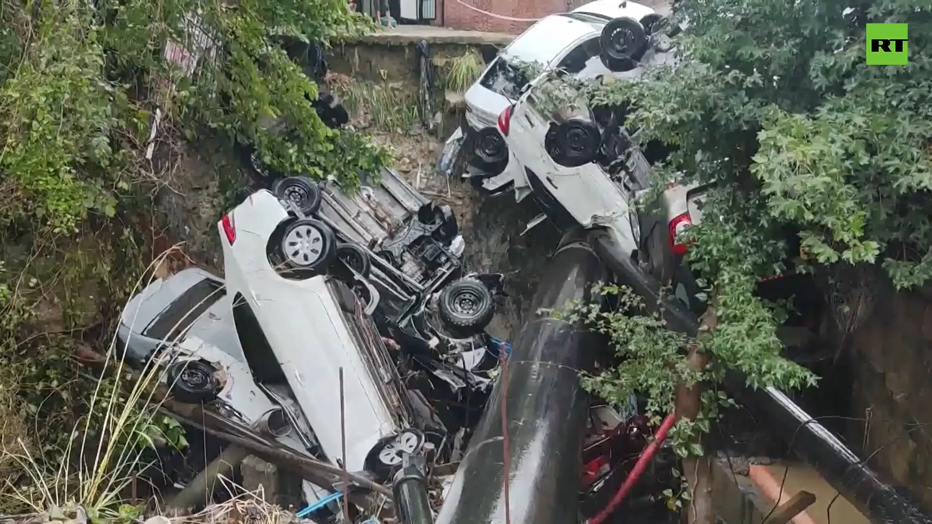 Dozens of cars washed away by floodwaters in Sochi