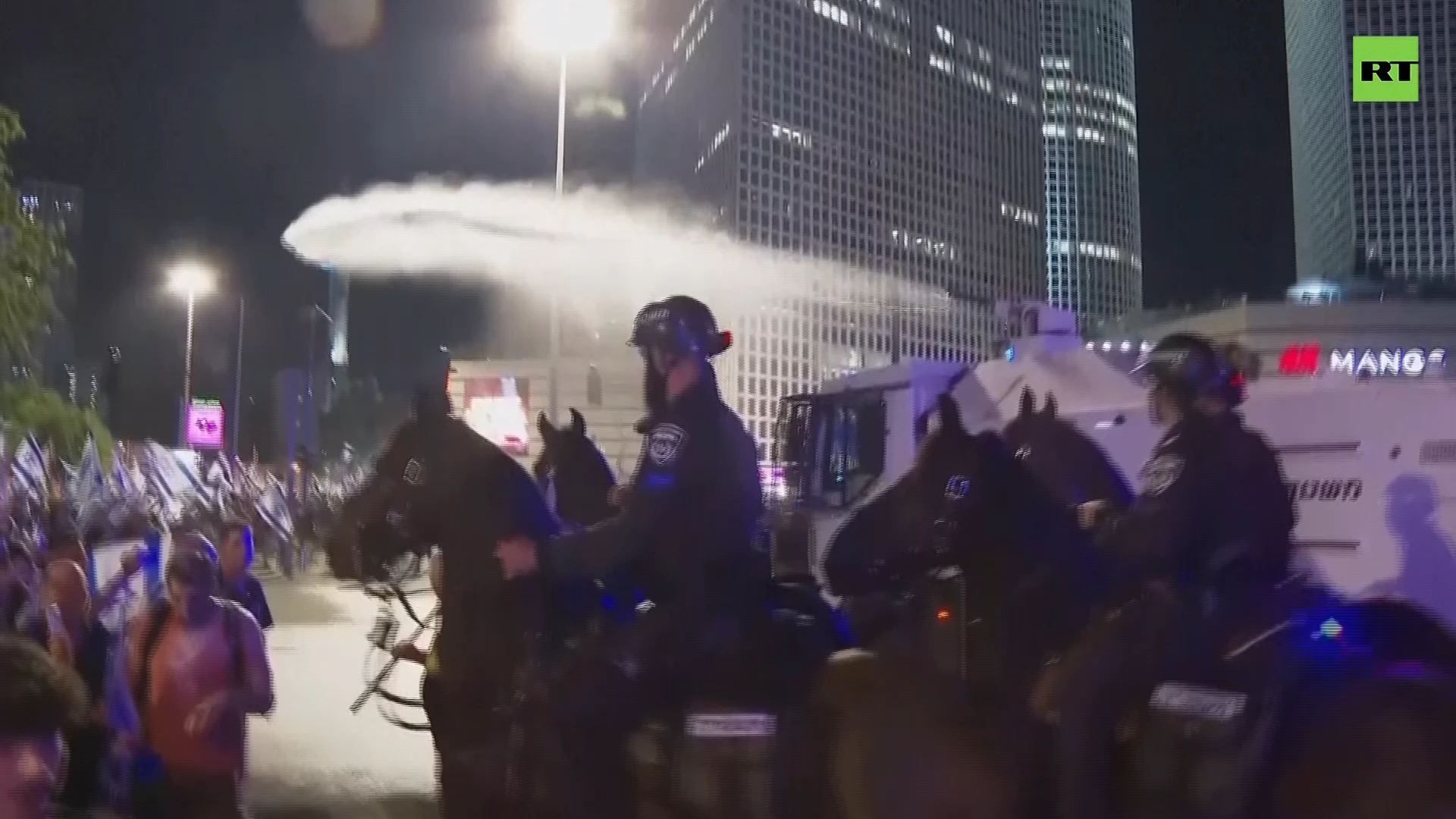 Police use water cannon to disperse protesters in Tel Aviv