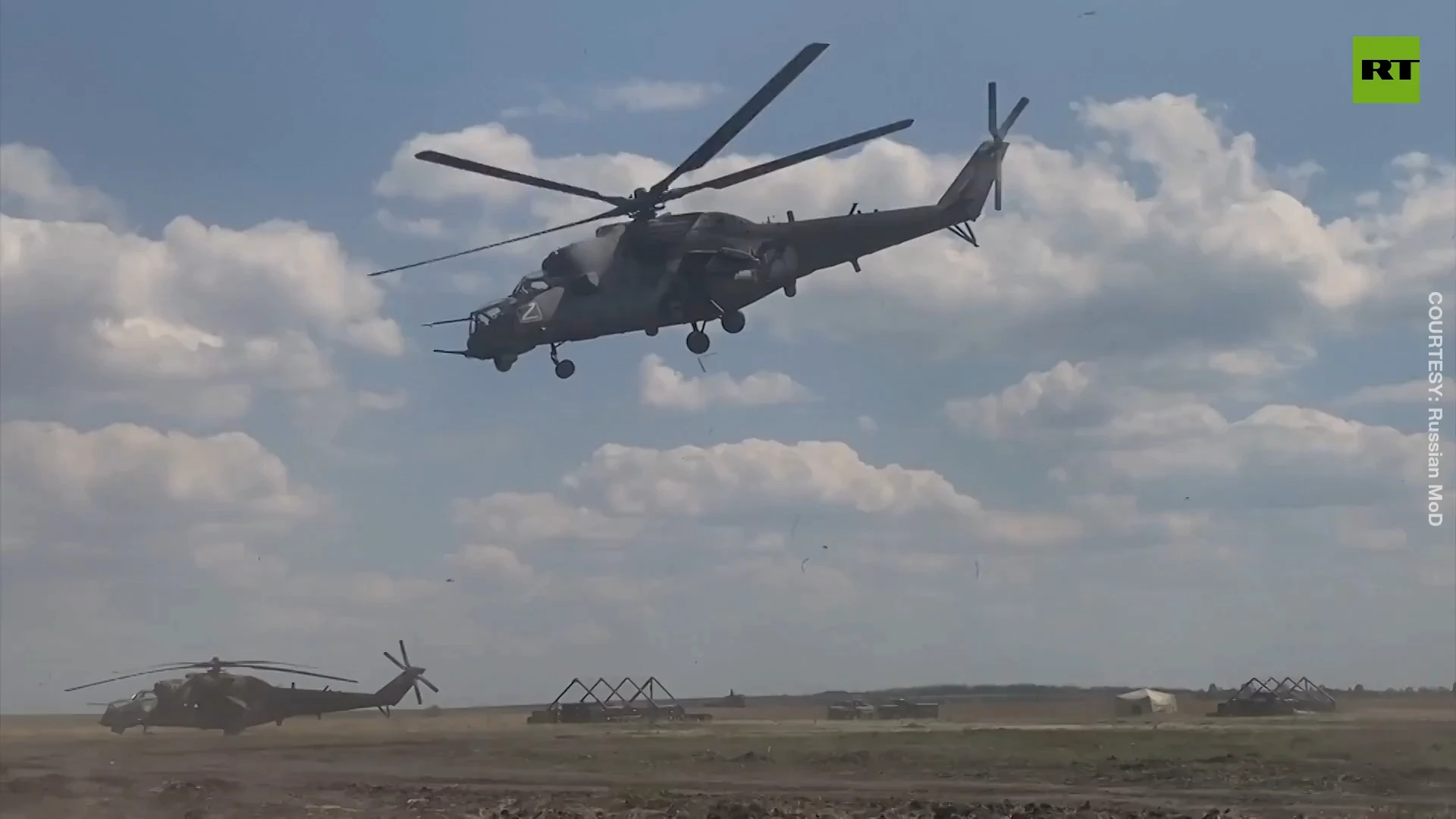 Russian Mi-35 and Mi-8 helicopters on duty in battle zone