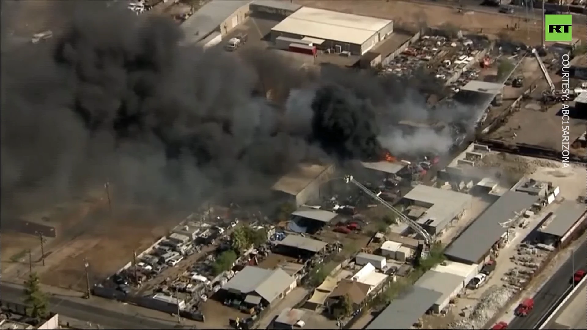 Over 100 firefighters battle blaze in Phoenix industrial area