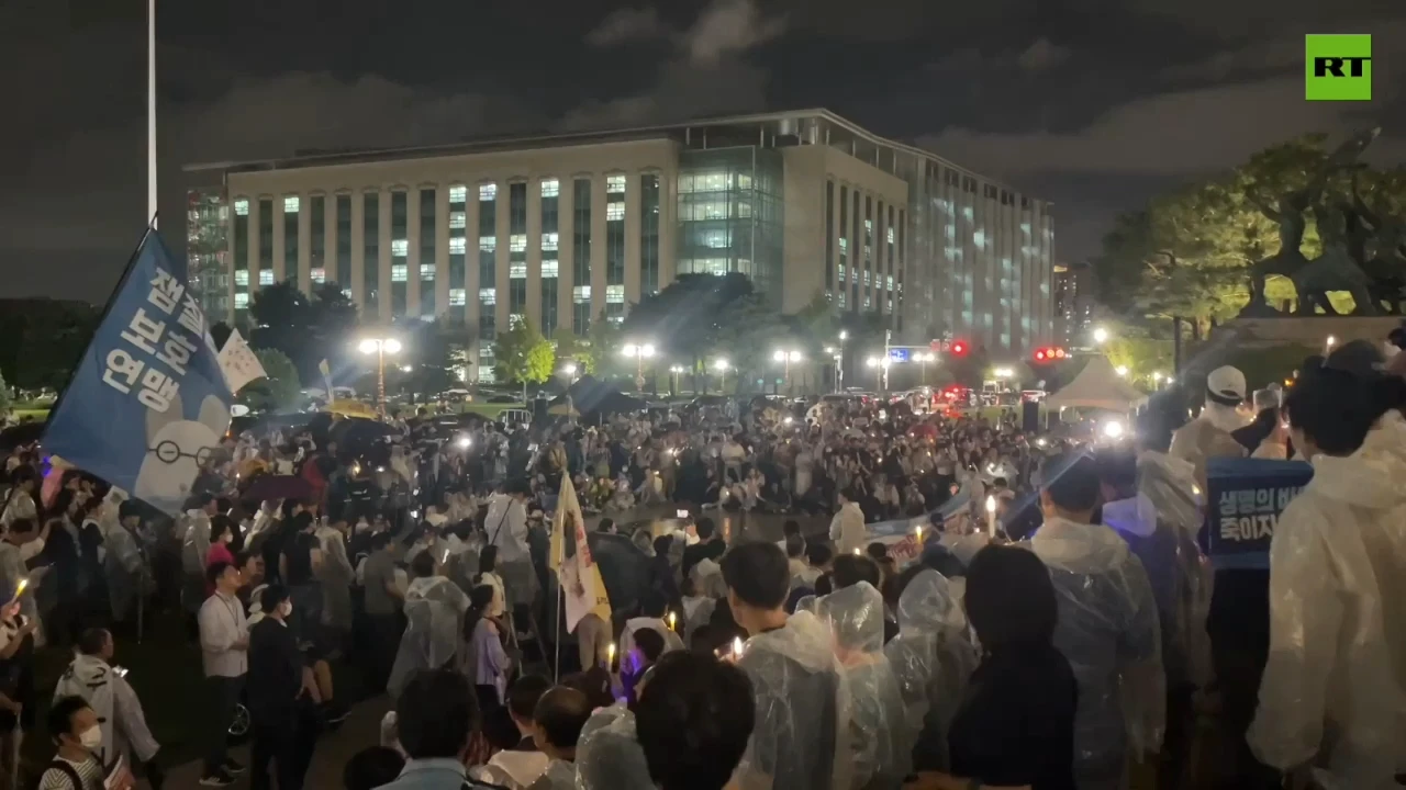 Hundreds hold candlelight vigil in Seoul, protesting against release of radioactive Fukushima water into the ocean