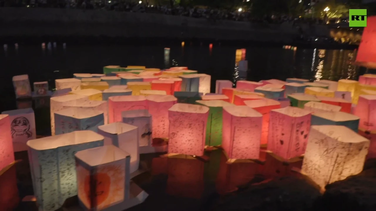 Lanterns illuminate Hiroshima's river to remember 1945 atomic bombing victims