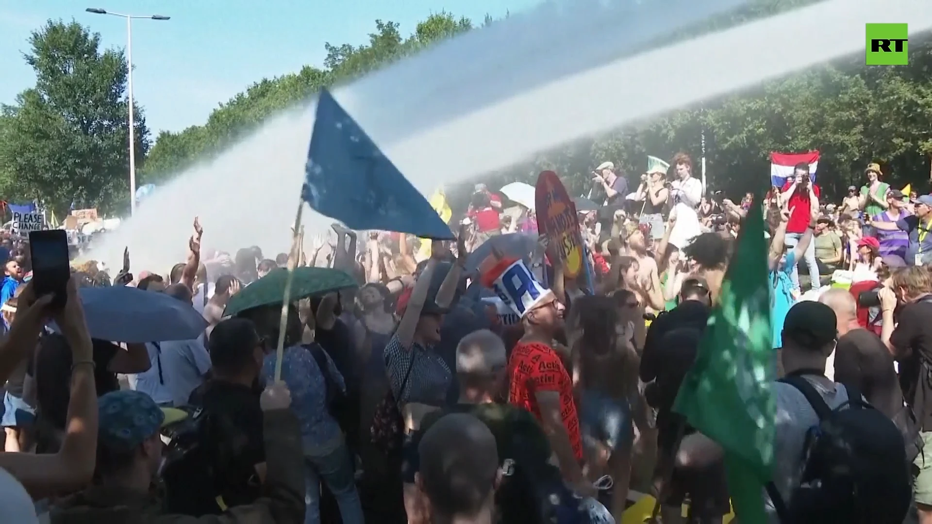 Thousands of climate protesters block highway in The Hague