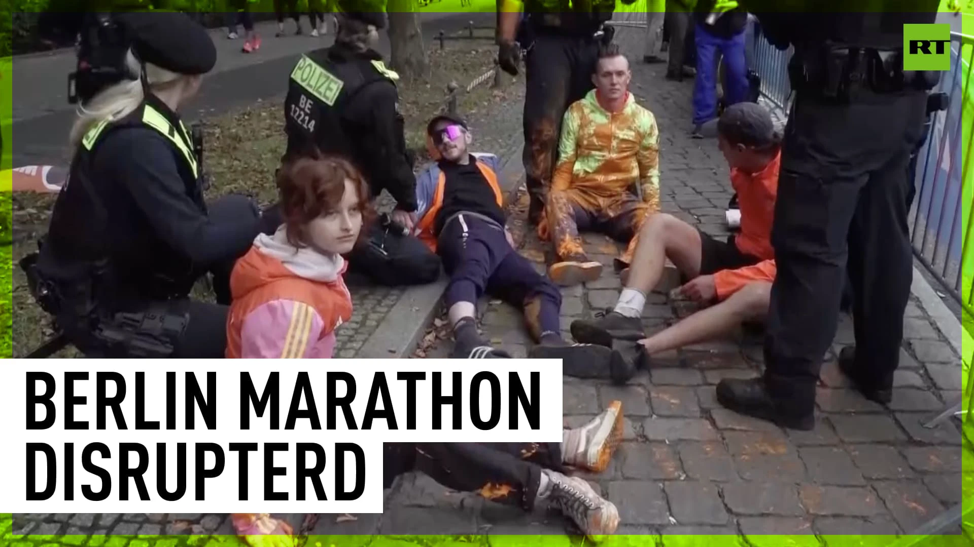 Environmental activists disrupt Berlin marathon with paint protest