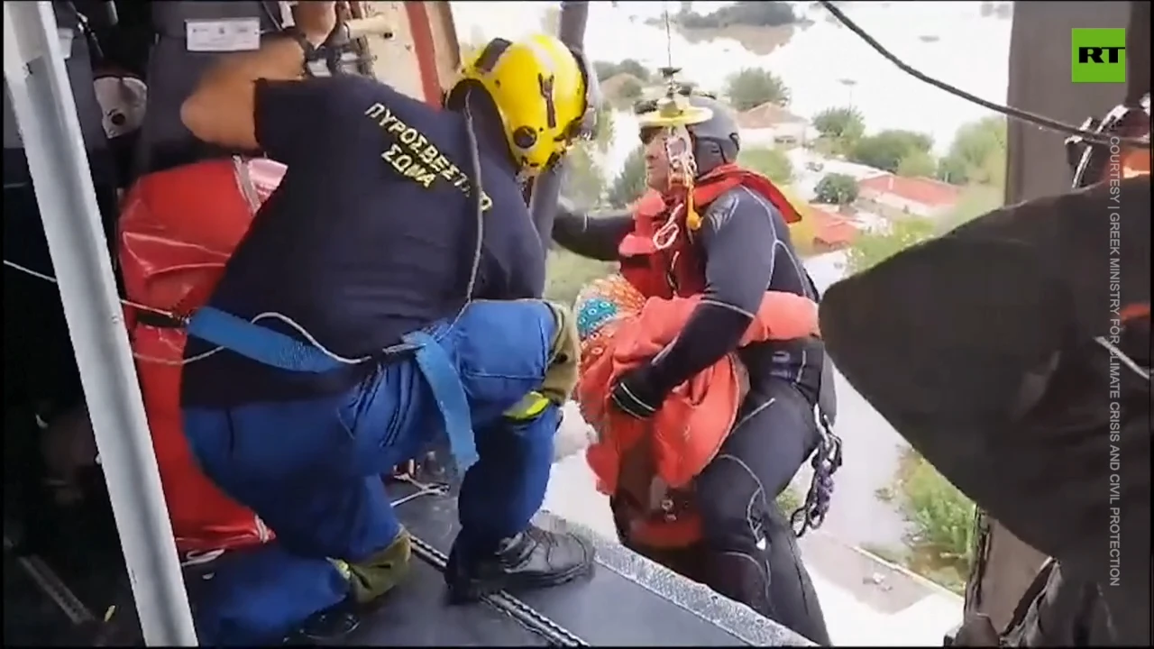 Greek army and emergency teams rescue people from flooded areas in central Greece