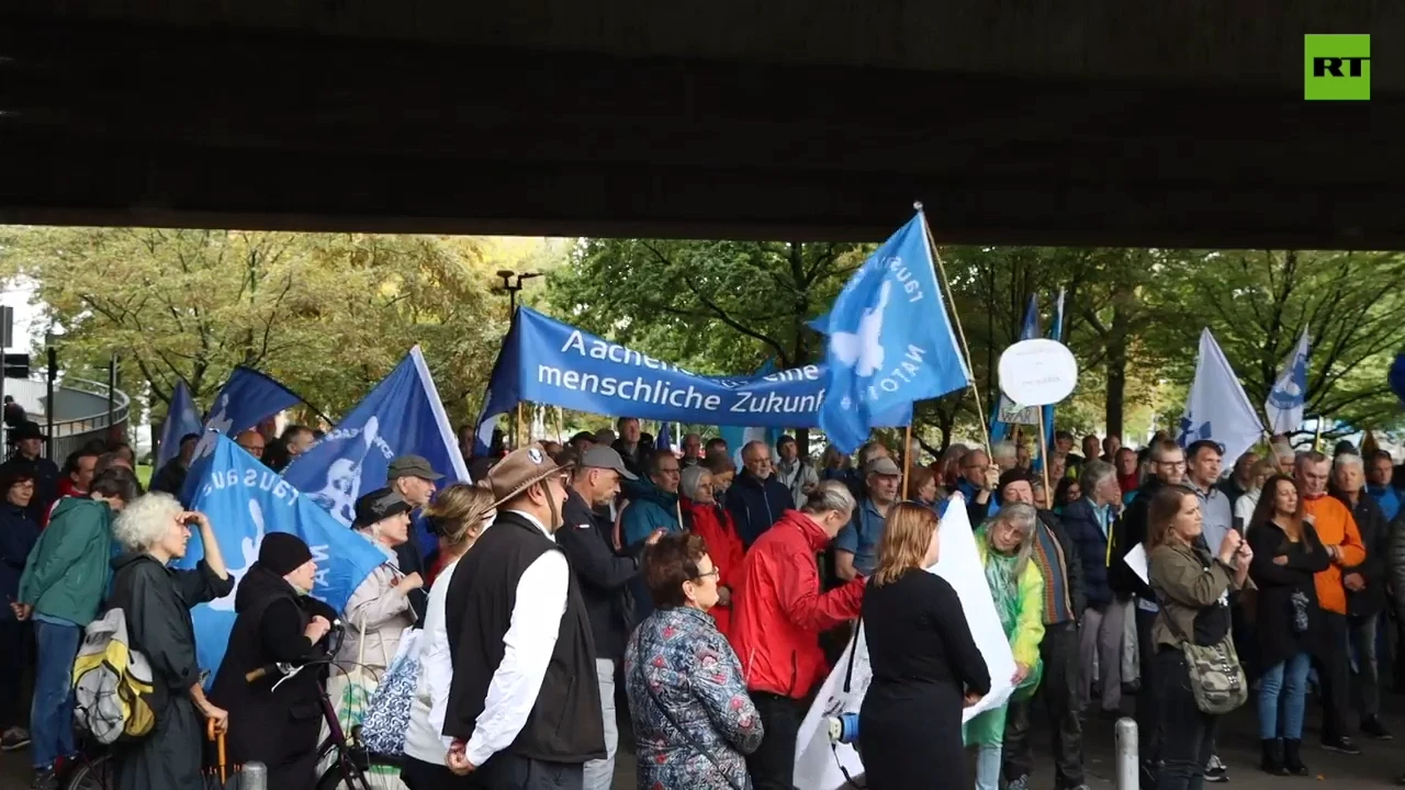 Dozens take to streets in Dusseldorf to protest military aid to Ukraine