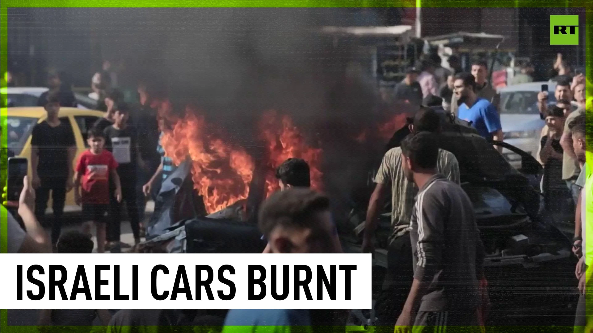 Palestinians burn seized Israeli cars, celebrate Hamas’ attack on the country