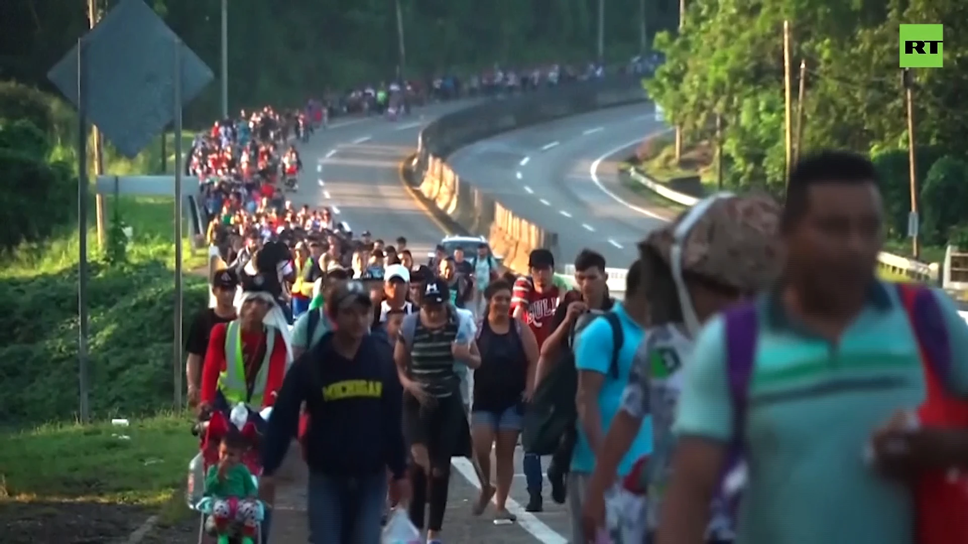 Thousands of migrants march through Mexico toward US