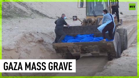 Dozens of bodies buried in mass grave in southern Gaza
