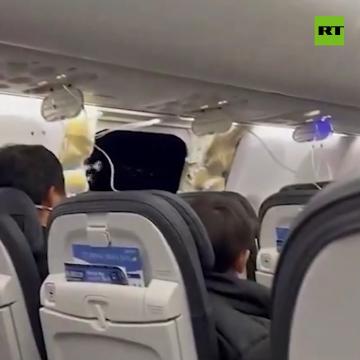 Plane window blows out mid-flight