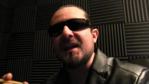 Mr Kiss Cuddles sings, "Bro - I Love You".