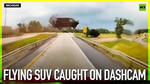 Flying SUV caught on dashcam