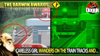 DARWIN AWARDS : CARELESS WOMAN WANDERS ON THE TRAIN TRACKS AND.. (RUSSIA)