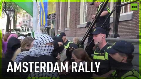 Pro-Palestinian activists protest at the University of Amsterdam over ties with Israel