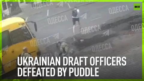 Ukrainian draft officers defeated by puddle