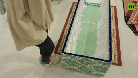 Japanese firm invites clients to try coffins