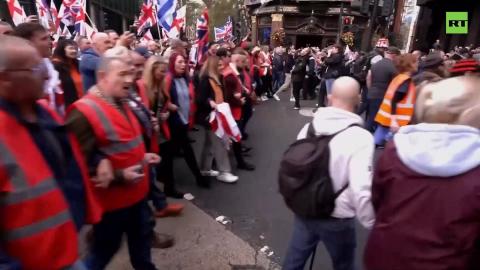 Tommy Robinson supporters rally in London