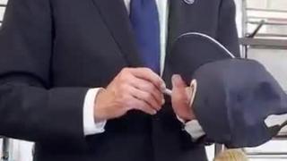 Joe Biden and the Trump hat