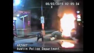 CAR BURST IN FLAMES WELL POLICE TRY TO DETAIN SUSPECT