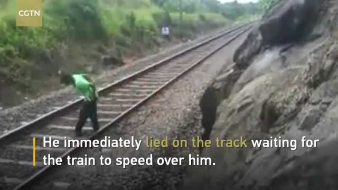 India train stunt_ Man risks life lying on railway tracks as train ...