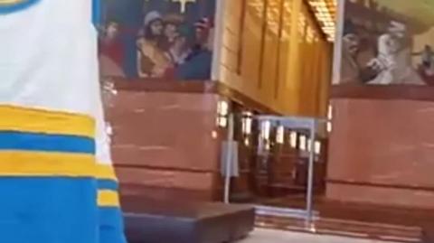 Freemason Illumanati Bank America Evil murals depicting Depopulation Agenda 2030 virus pandemic and boy with his eye covered on checker floor board