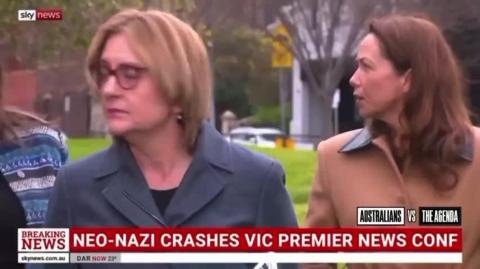 Thomas Sewell and Victorian Premier Jacinta Allan paths cross in a park