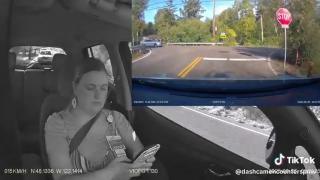 Another IDIOT woman driver - Texting